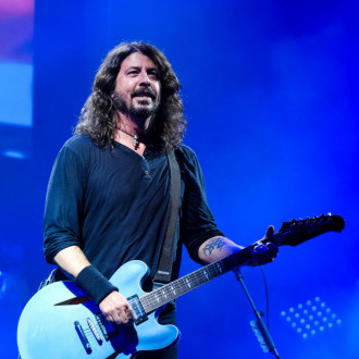 Dave Grohl chokes back tears at Taylor Hawkins tribute concert